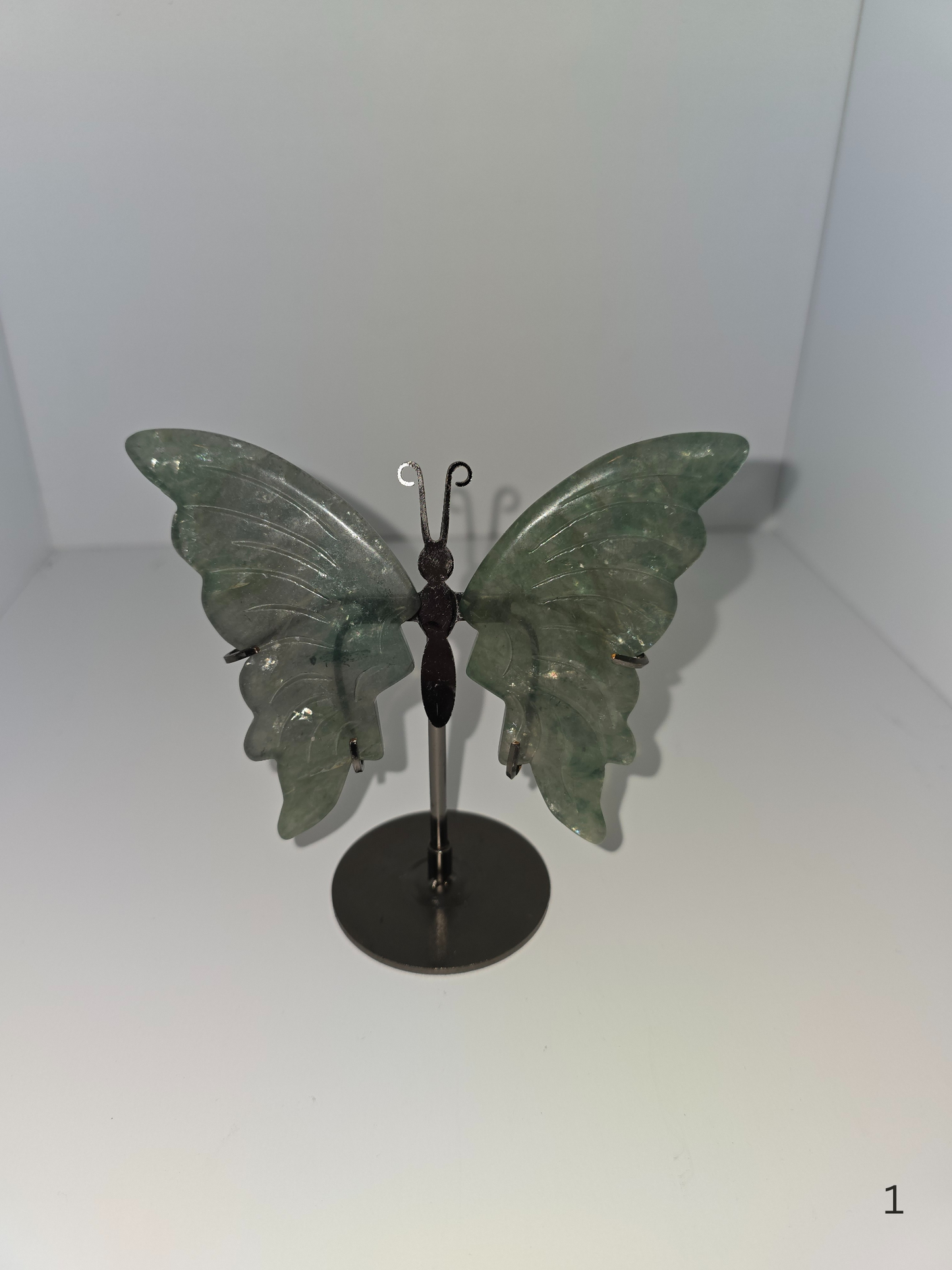 Green fluorite butterfly wings on stand
